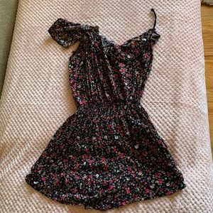 One shoulder black dress with flower design